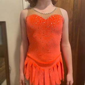 Gorgeous coral Sharene ice skating competition dress with Swarovski crystals.